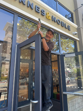 Rodney Beliso installing commercial door lock Fremont CA locksmith